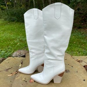 Knee tall white boots